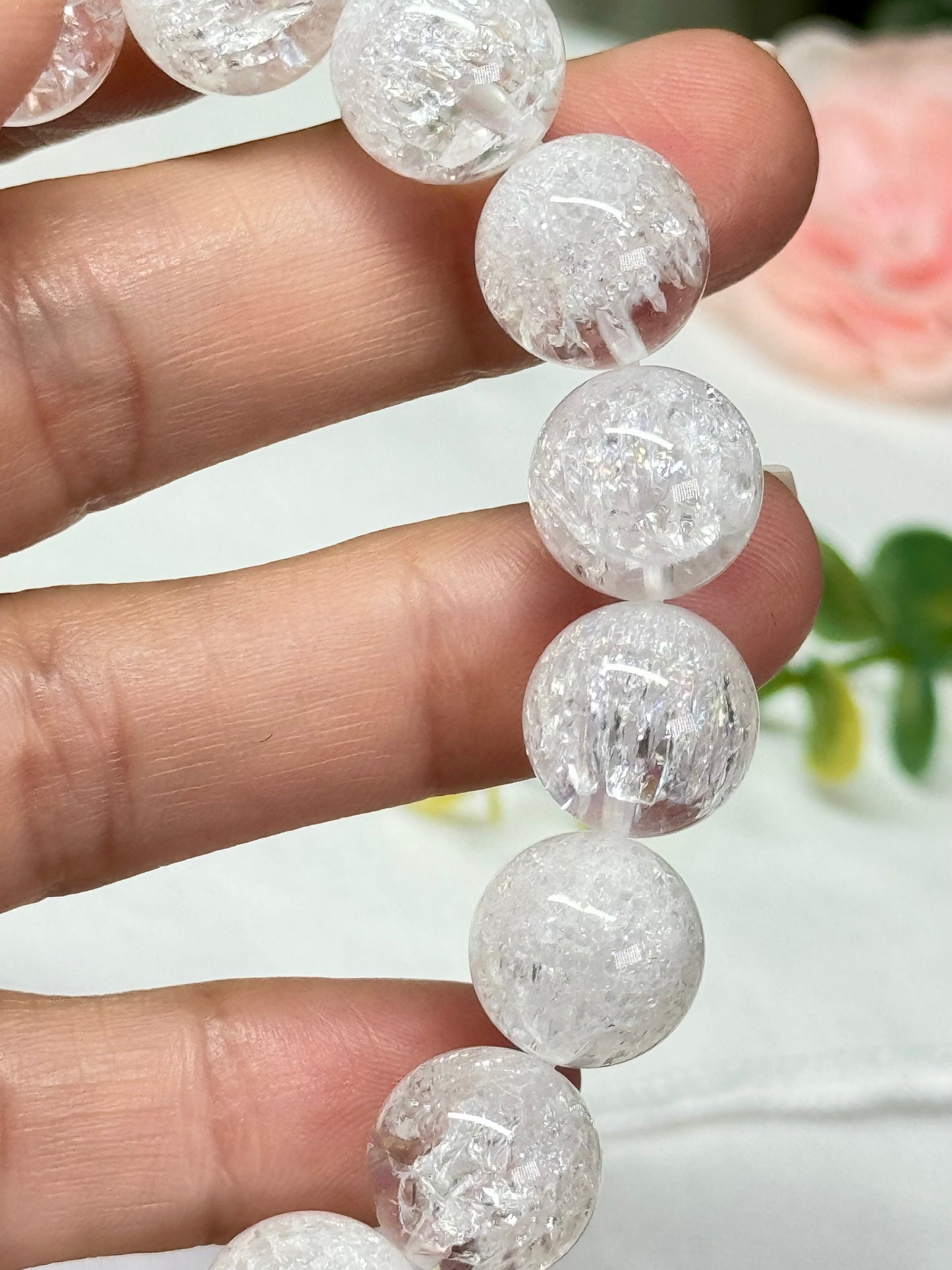 White quenched quartz. See photos for detailed view. 12.2mm beads and fits wrist size 7.25”