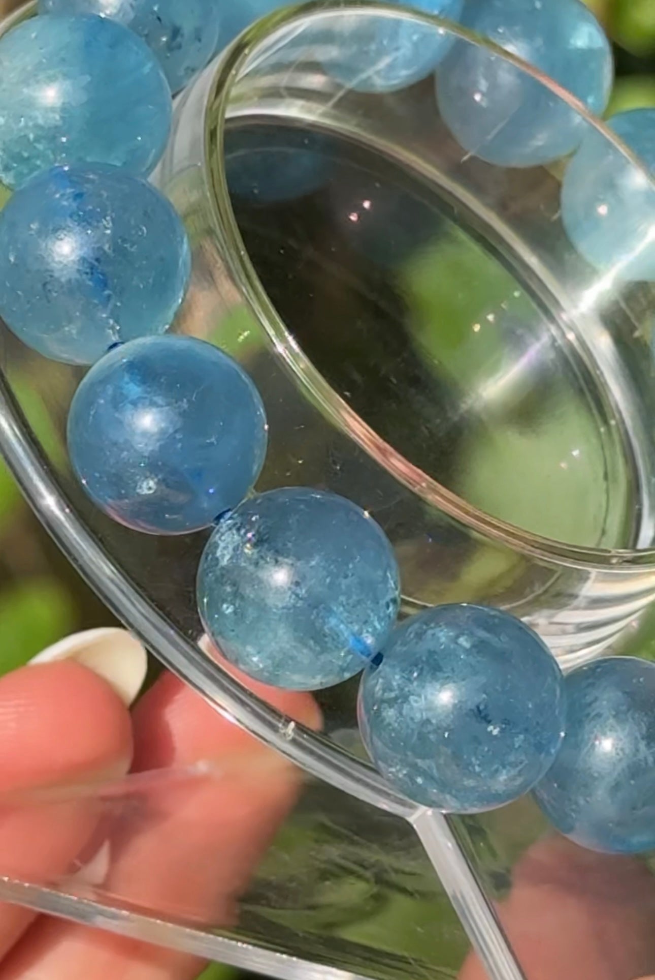 HQ aquamarine bracelet. With asterisms and chatoyancy. Deep blue color and fabulous! Please see all pics for details. 13.6mm beads and fits wrist size 7” can be downsized