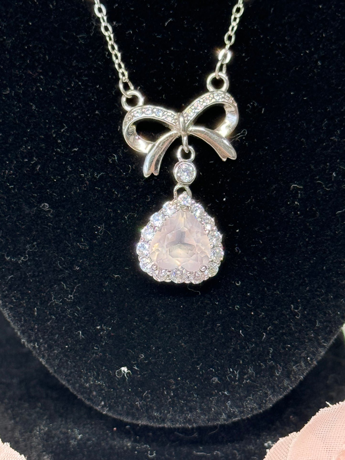 Madagascar rose Quartz heart with bow necklace. S925 sterling silver with 16.5-18” adjustable chain